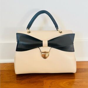 Big Neutral color bag with Black Bow and top handle and removable strap Aldo